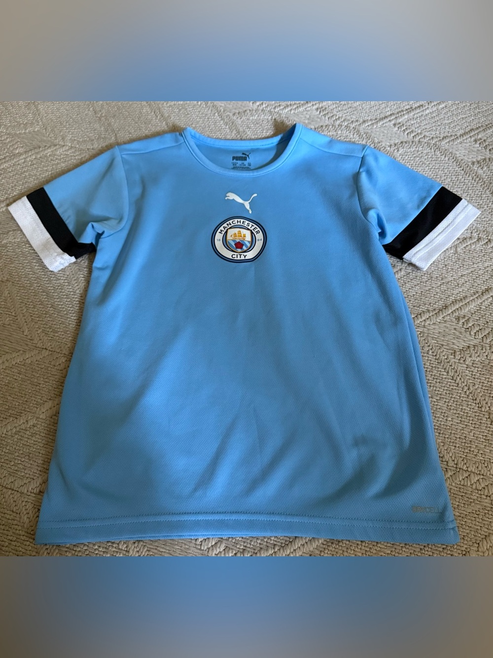 Like New! PUMA Manchester City Kids Short-Sleeve Practice Jersey. Size Medium.